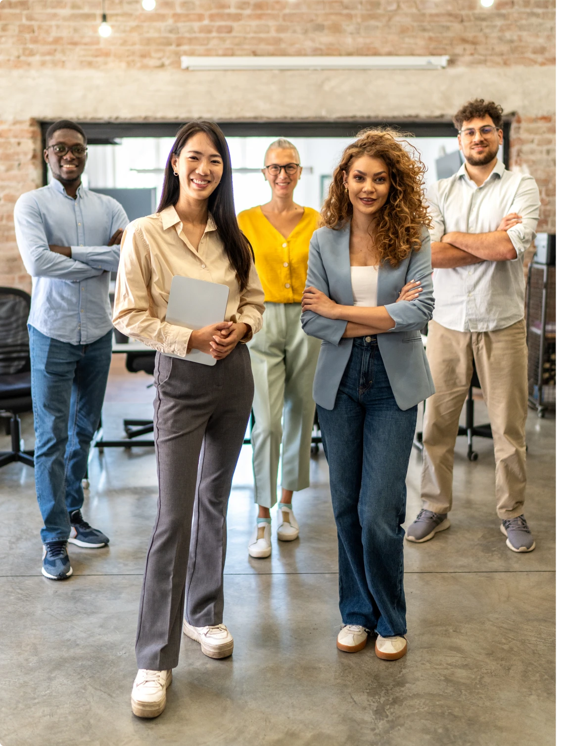 Group of professionals smiling in workplace