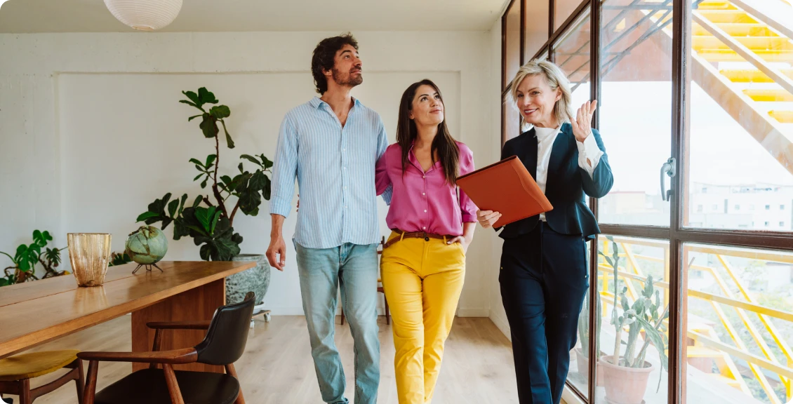 Real estate showing with clients and agent