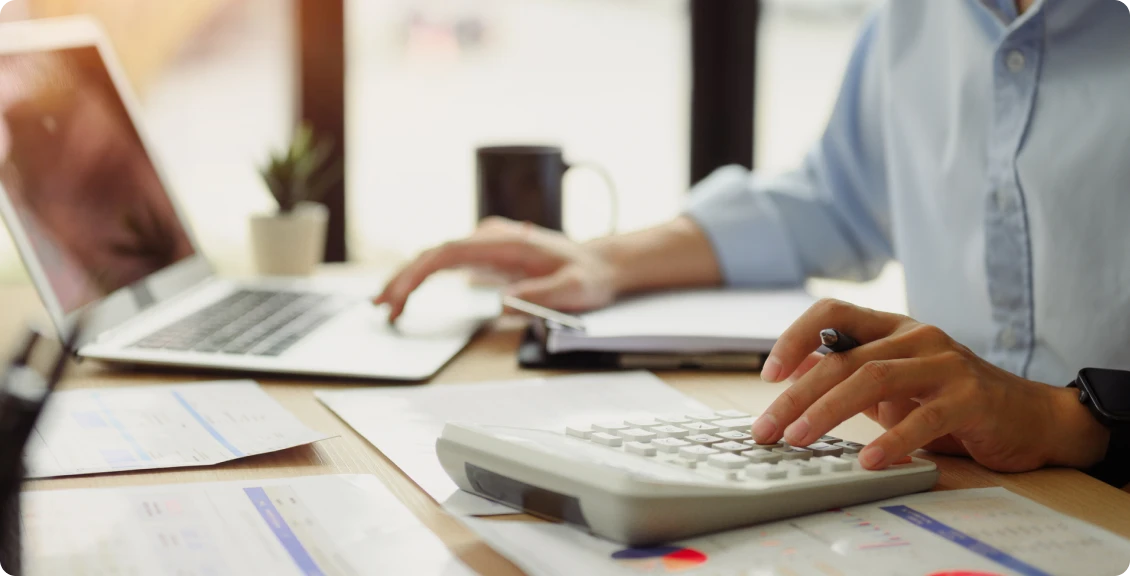 Calculating finances on a desk